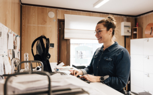 Pauliina Kovanen on a computer.