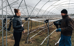 Pauliina Kovanen and seasonal worker.